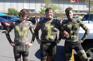 Three horribly painted Mizzou freshmen.