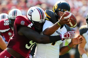 A USC pass rusher hits Mizzou QB James Franklin just as he is about to throw